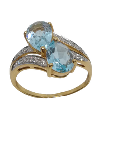 Bague en or, topaze bleue et oxyde de zirconium